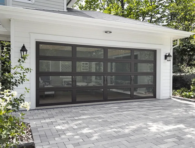 Maple Heights Garage Door Repair design specialist presenting custom garage door options to Maple Heights homeowner