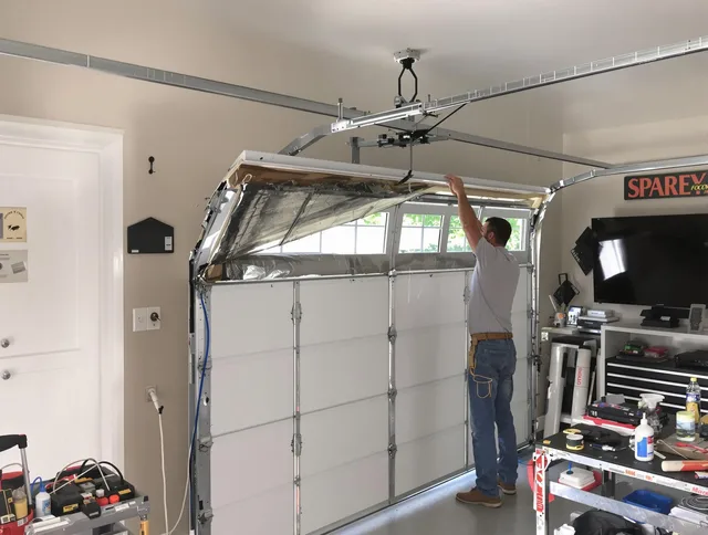 Garage door section replacement by Maple Heights Garage Door Repair in Maple Heights