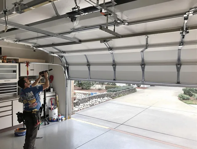 Garage door track repair service by Maple Heights Garage Door Repair in Maple Heights